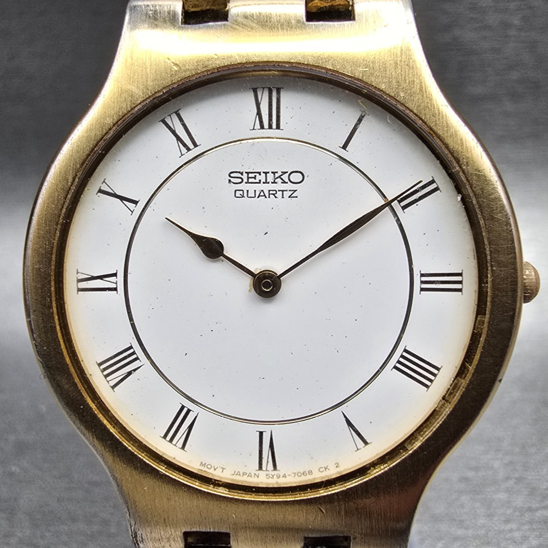 Seiko Watch Men 33mm White Dial Gold Tone Round 5Y94-7029 New Battery Vintage1
