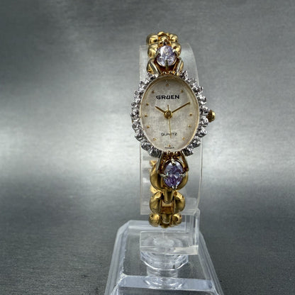 Gruen Watch Women 18mm White Dial Gold Tone Oval Pink Gem Stones New Battery ABC5