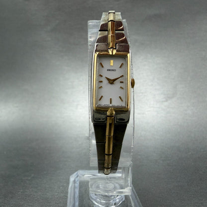 Seiko Watch Women 13mm White Dial Two Tone Rectangle 2E20-7479 New Batt NBT845