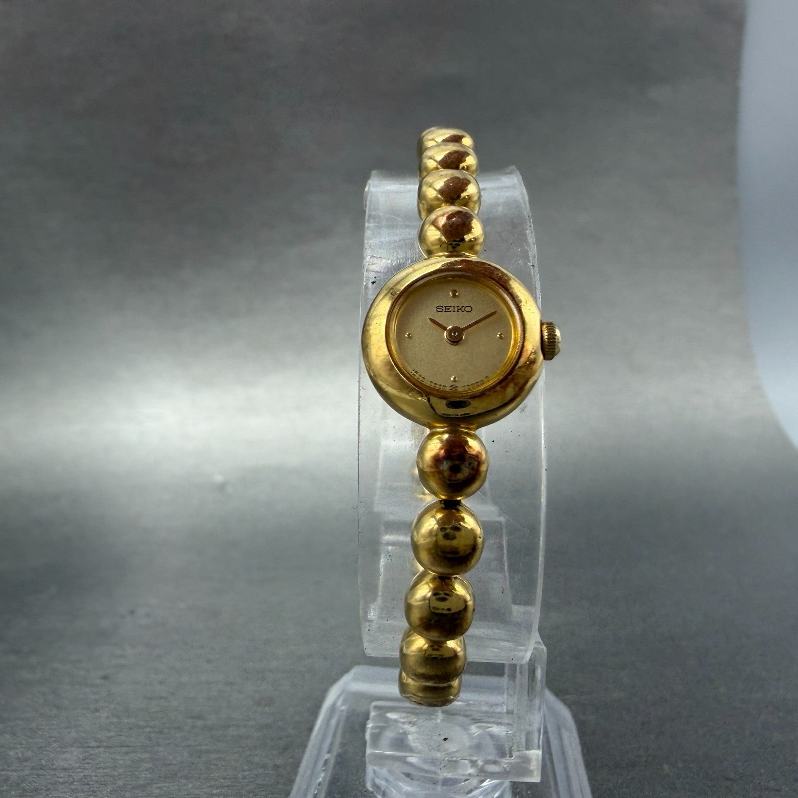 Seiko Watch Women 14mm Champagne Dial Gold Tone Round 1E20-0070 New Battery5
