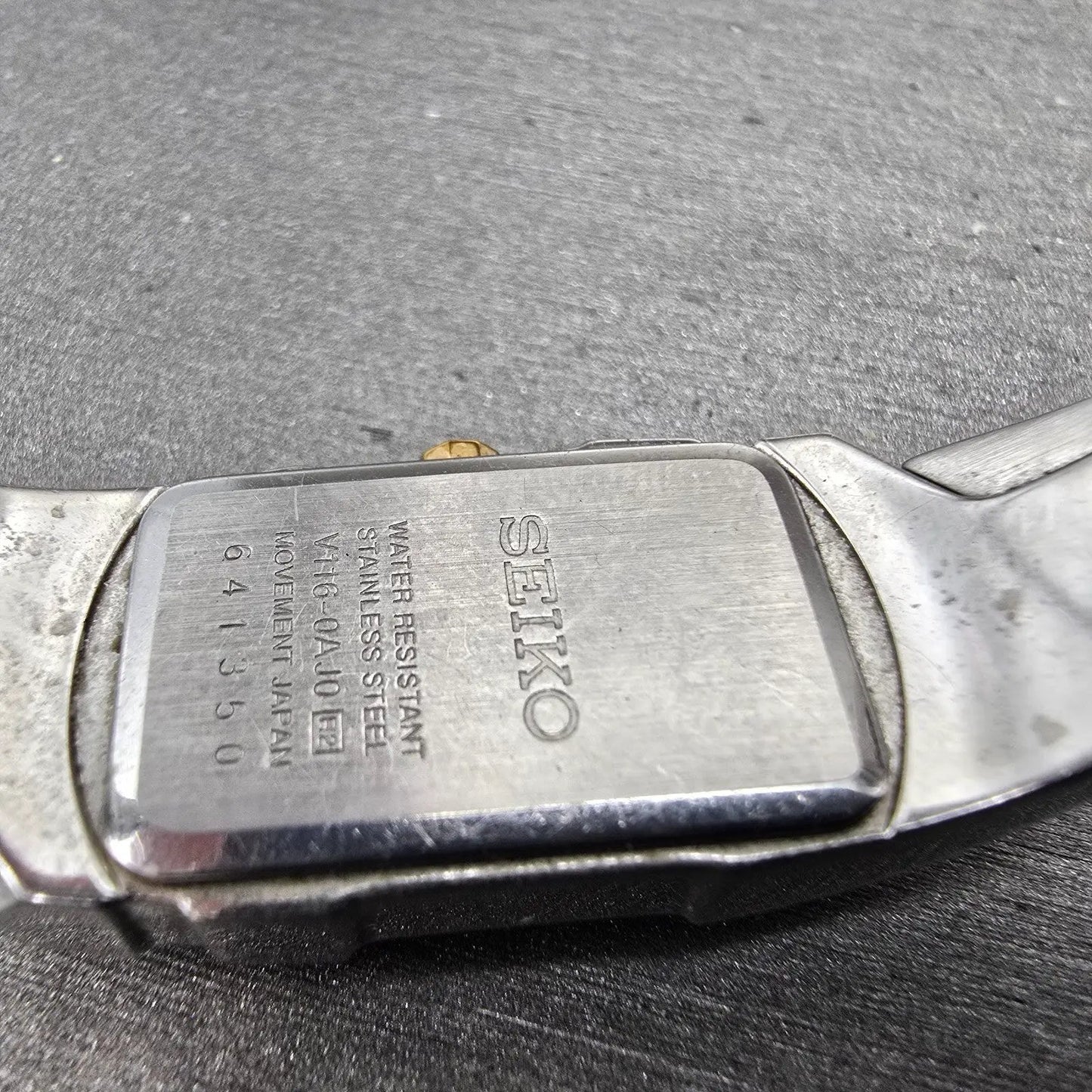 Seiko Solar Tank Watch Women 15mm MOP Dial Two Tone Rectangle V116-0AJ0 Runs9