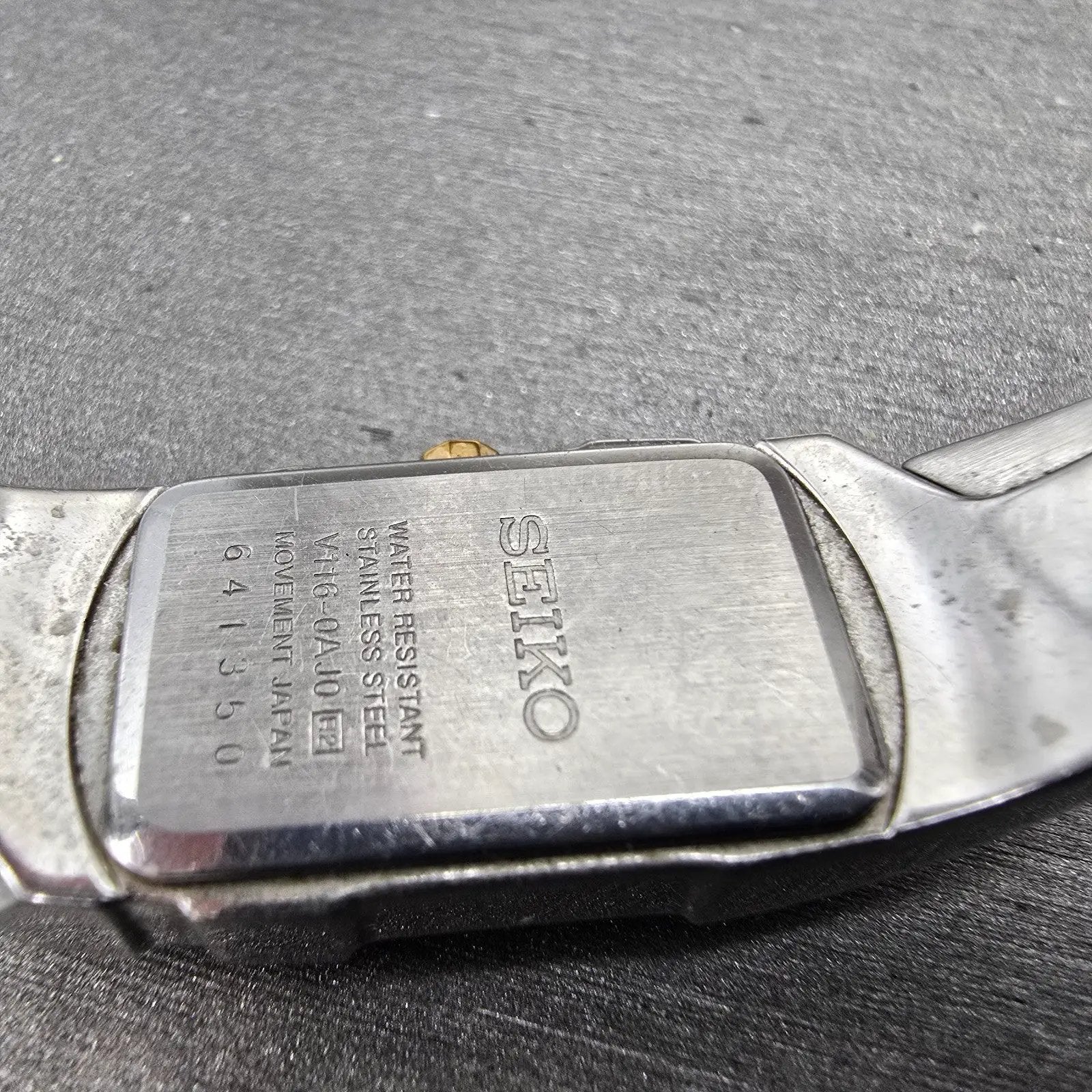 Seiko Solar Tank Watch Women 15mm MOP Dial Two Tone Rectangle V116-0AJ0 Runs9