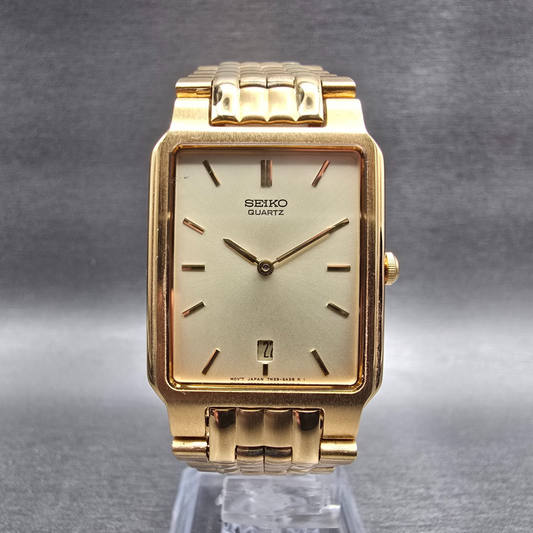 Seiko Tank Watch Men 26mm Champagne Dial Gold Date Rectangle 7N29-5A60 New Batt0