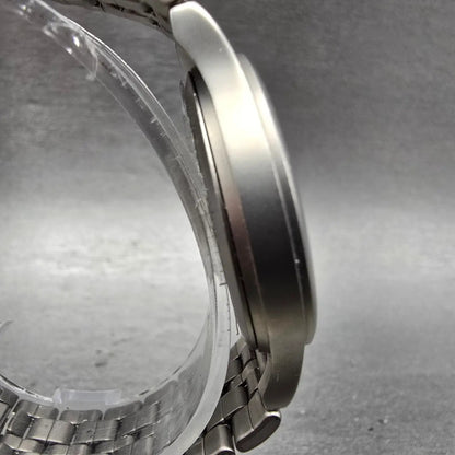 Skagen Watch Men 34mm Gray Dial Titanium Date Round 105LTX New Battery3