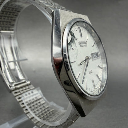Seiko SQ Watch Men 35mm Silver Dial Silver Tone Daydate Round 8123 PARTS4