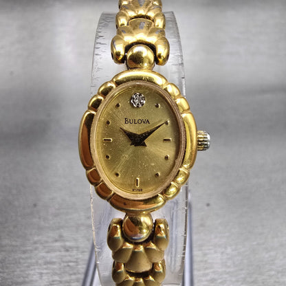 Bulova Watch Women 16mm Gold Dial Gold Tone Oval Diamond Accent New Battery VTG0