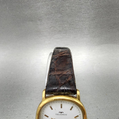 Technos Watch Women 23mm White Dial Gold Tone Date Oval 51178 New Battery4