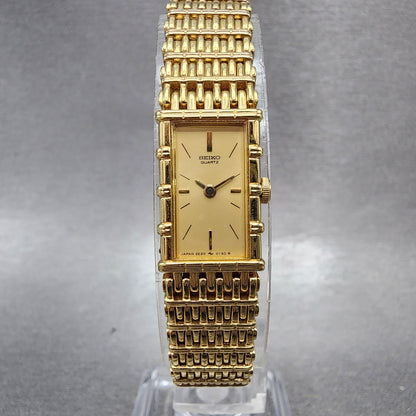 Seiko Tank Watch Women 12mm Champagne Dial Gold Tone 2e205079 New Battery0