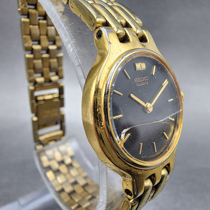 Seiko Watch Women 22mm Black Dial Gold Tone Round 1N000A99 CRACKED New Battery3