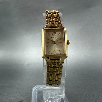 Seiko Tank Watch Women 16mm Champagne Dial Gold Tone 1N01-0FH0 New Battery NMZ6