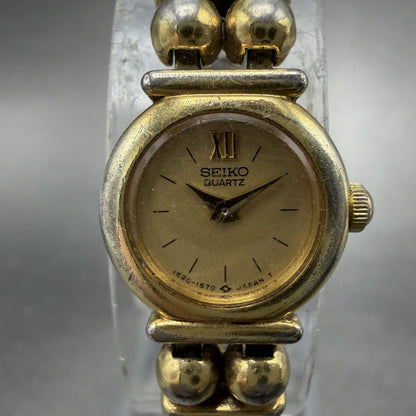Seiko Watch Women 15mm Champagne Dial Gold Tone Round 1E20-0449 New Battery1