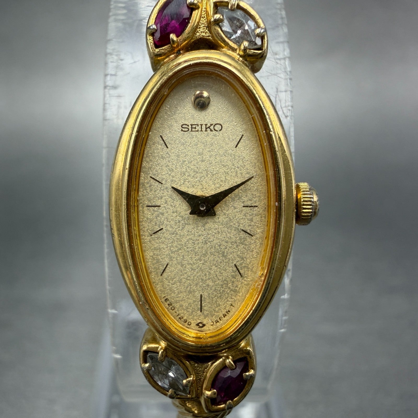 Seiko Watch Women 13mm Champagne Dial Gold Tone Oval 1E20-5760 New Battery Gems1