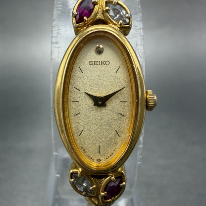 Seiko Watch Women 13mm Champagne Dial Gold Tone Oval 1E20-5760 New Battery Gems1