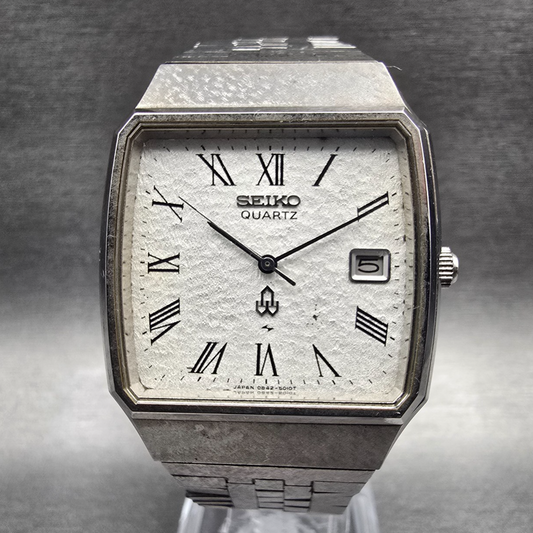 Seiko Watch Men 33mm Silver Dial Silver Tone Date Rectangle 0842-5010 New Batt0