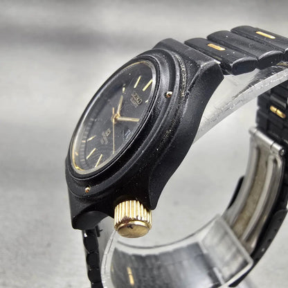 Seiko SQ Sports 100 Watch Women 26mm Black Dial Black & Gold Tone Daydate NewBat2