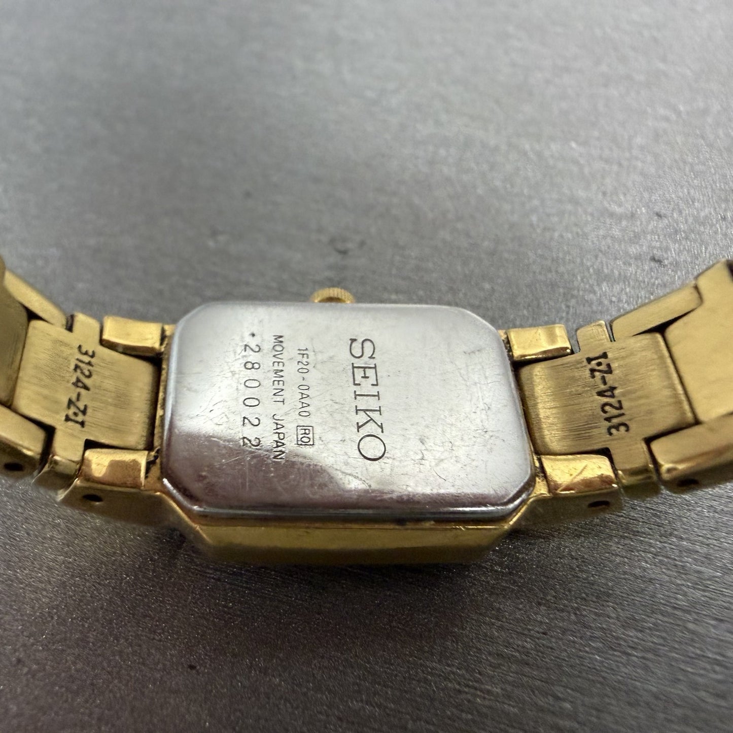 Seiko Tank Watch Women 15mm Black Dial Gold Tone Rectangle 1F200AA0 New Battery9