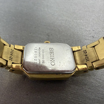 Seiko Tank Watch Women 15mm Black Dial Gold Tone Rectangle 1F200AA0 New Battery9