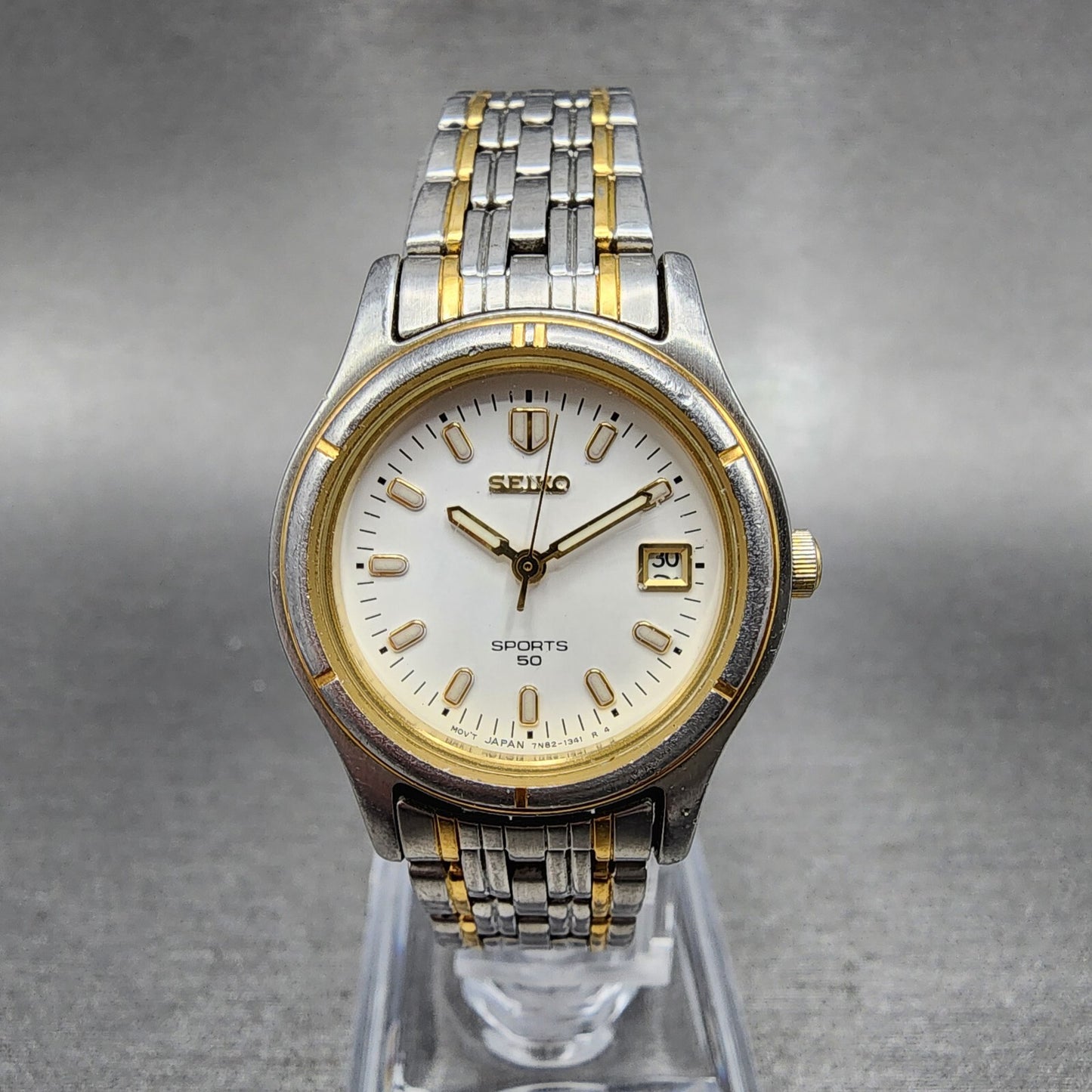 Seiko Sports 50 Watch Women 26mm White Dial Two Tone Date Round 7N820539 Works0