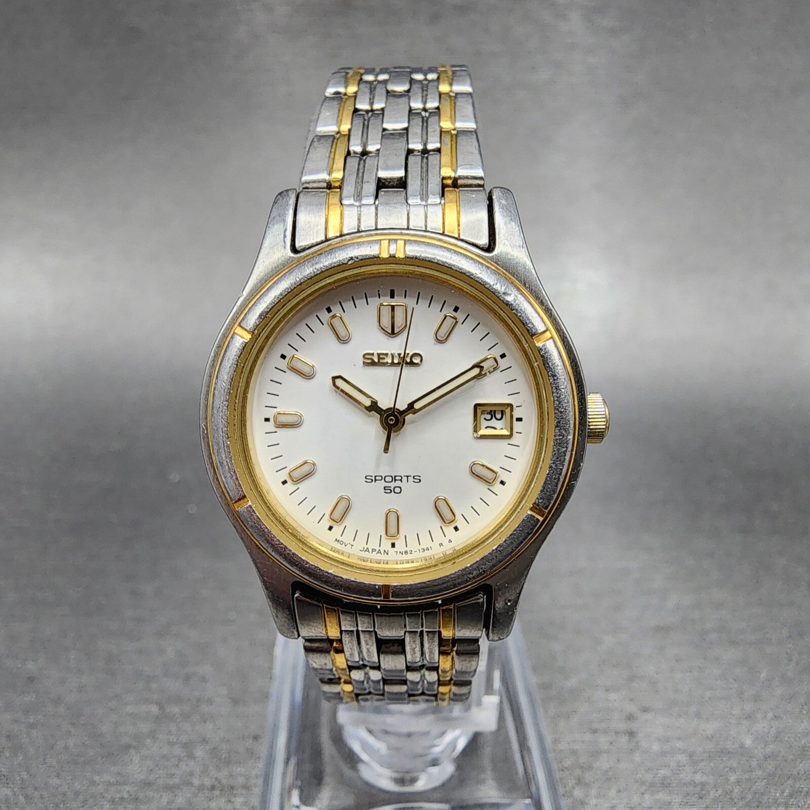 Seiko Sports 50 Watch Women 26mm White Dial Two Tone Date Round 7N820539 Works0