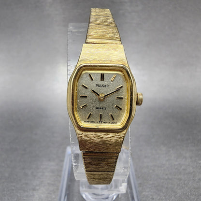 Seiko Pulsar Watch Women 16mm Champagne Dial Gold Tone Rectangle New Battery0