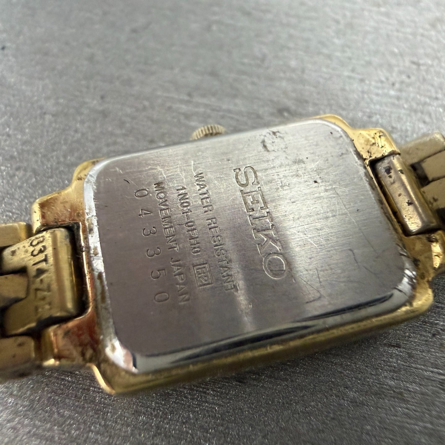 Seiko Tank Watch Women 16mm Champagne Dial Gold Tone 1N01-0FH0 New Battery ZYGF69