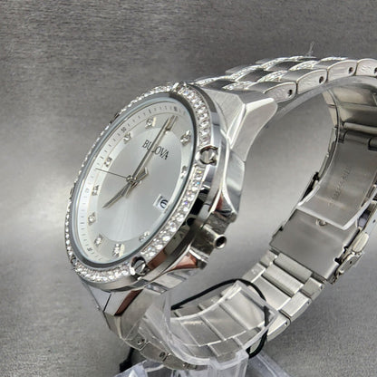 Bulova silver stainless steel diamond bezel watch with silver dial on gray background