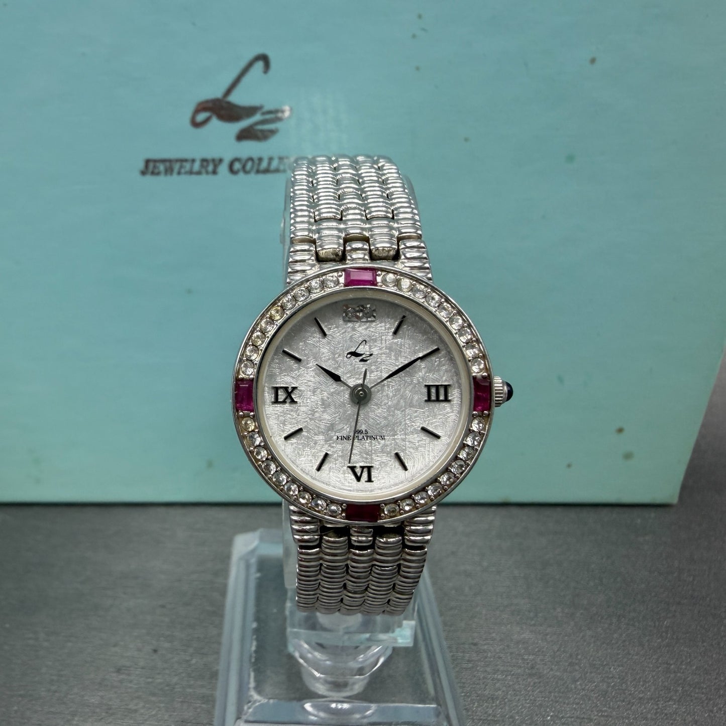 LZ Watch Women 25mm White Dial Silver Tone Ruby Bezel Round New Battery0