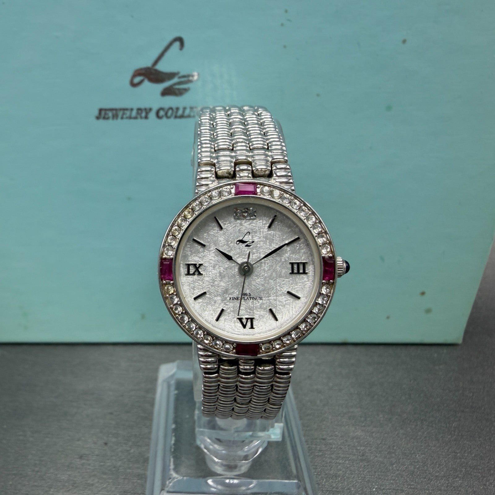 LZ Watch Women 25mm White Dial Silver Tone Ruby Bezel Round New Battery0