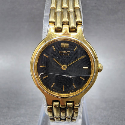Seiko Watch Women 22mm Black Dial Gold Tone Round 1N000A99 CRACKED New Battery0