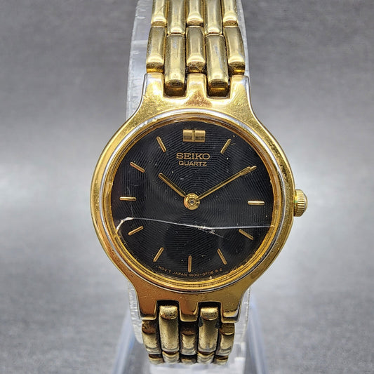 Seiko Watch Women 22mm Black Dial Gold Tone Round 1N000A99 CRACKED New Battery0