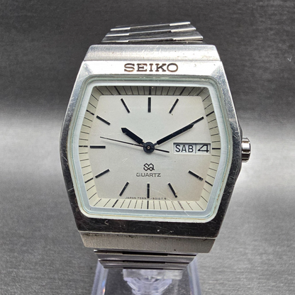 Seiko SQ Watch Men 35mm Silver Dial Silver Daydate Hexagon 7559-5010 New Battery0