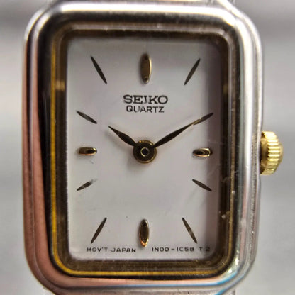 Seiko Watch Women 15mm White Dial Silver Tone Rectangle 1N00-0D09 New Battery1