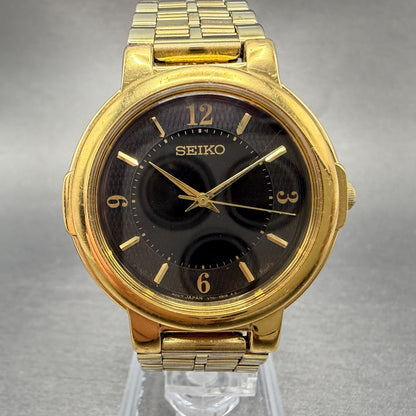 Seiko Watch Men 34mm Black Dial Gold Tone Round V701-2F30 New Battery Vintage0