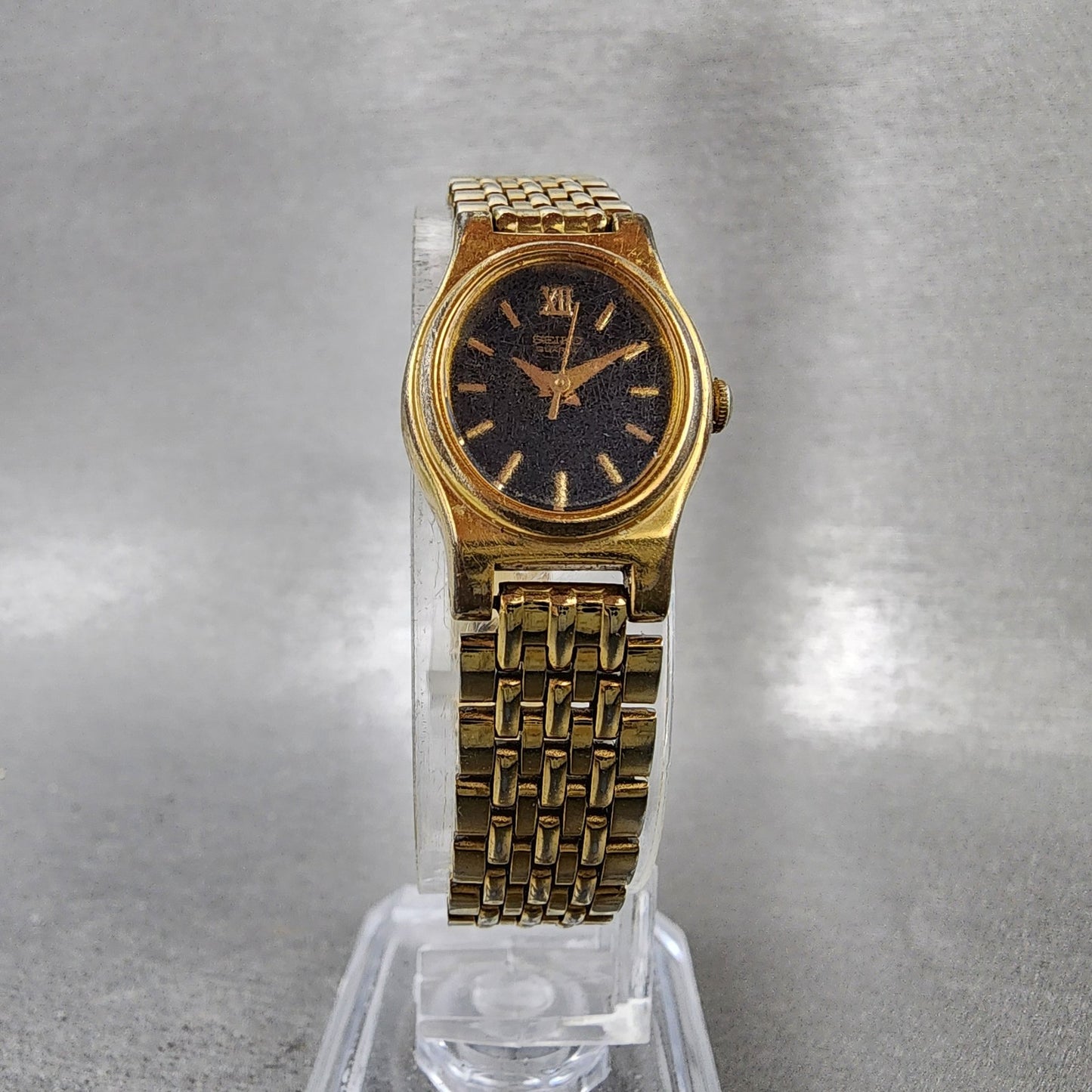 Seiko Watch Women 18mm Black Dial Gold Tone Oval V4015109 New Battery ABC1235