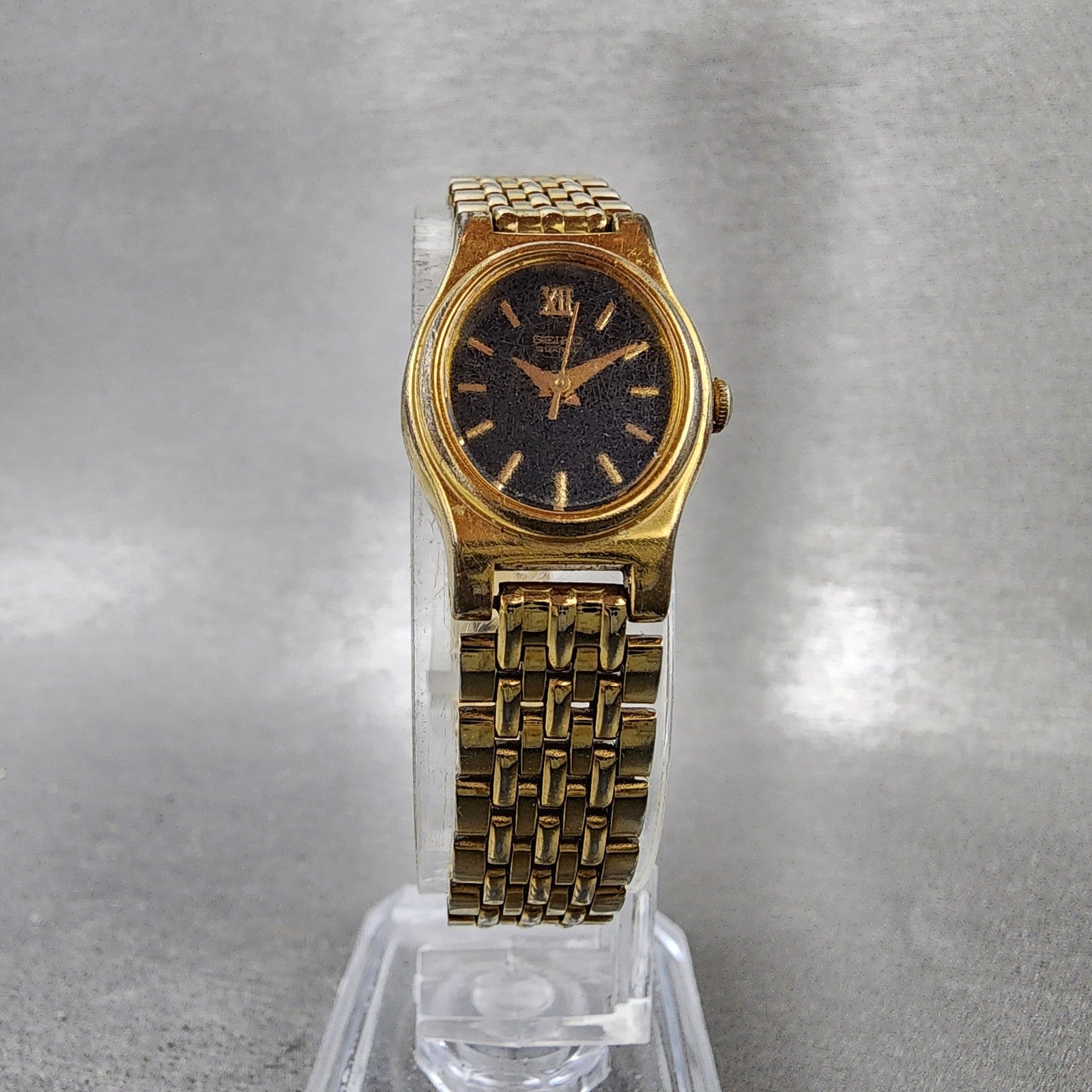 Seiko Watch Women 18mm Black Dial Gold Tone Oval V4015109 New Battery ABC1235