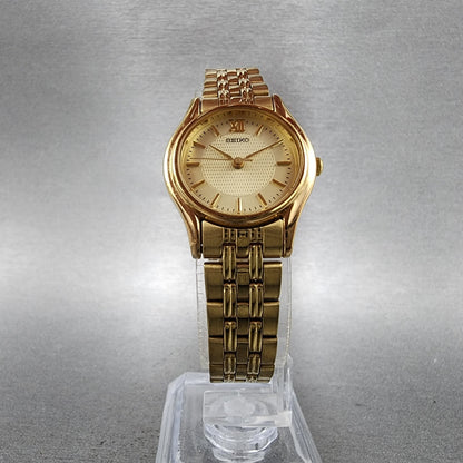 Seiko watch Women 24mm Champagne Dial Gold Tone Round V4011600 New Battery5