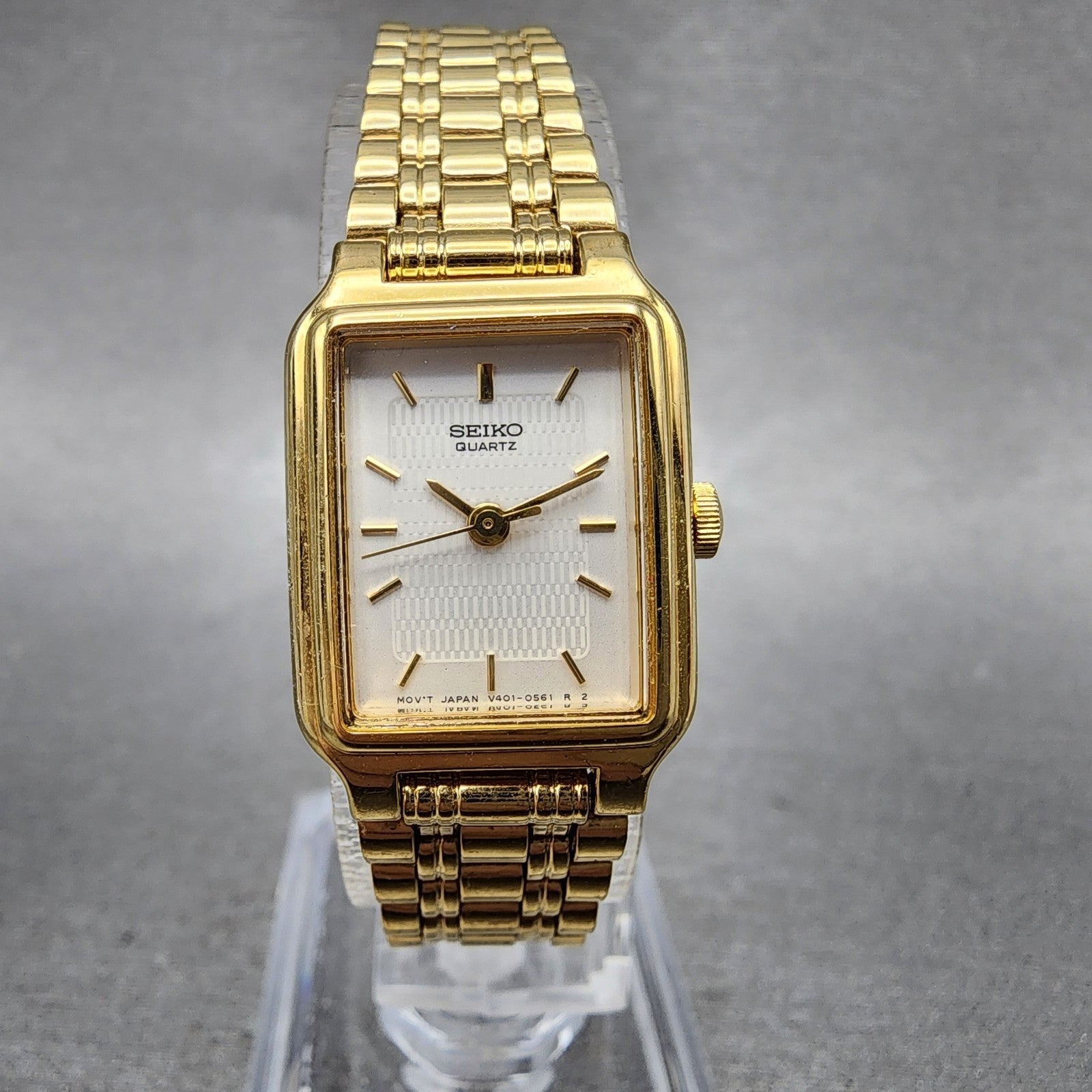 Seiko Tank Watch Women 18mm White Dial Gold Tone Rectangle V4015129 New Battery0