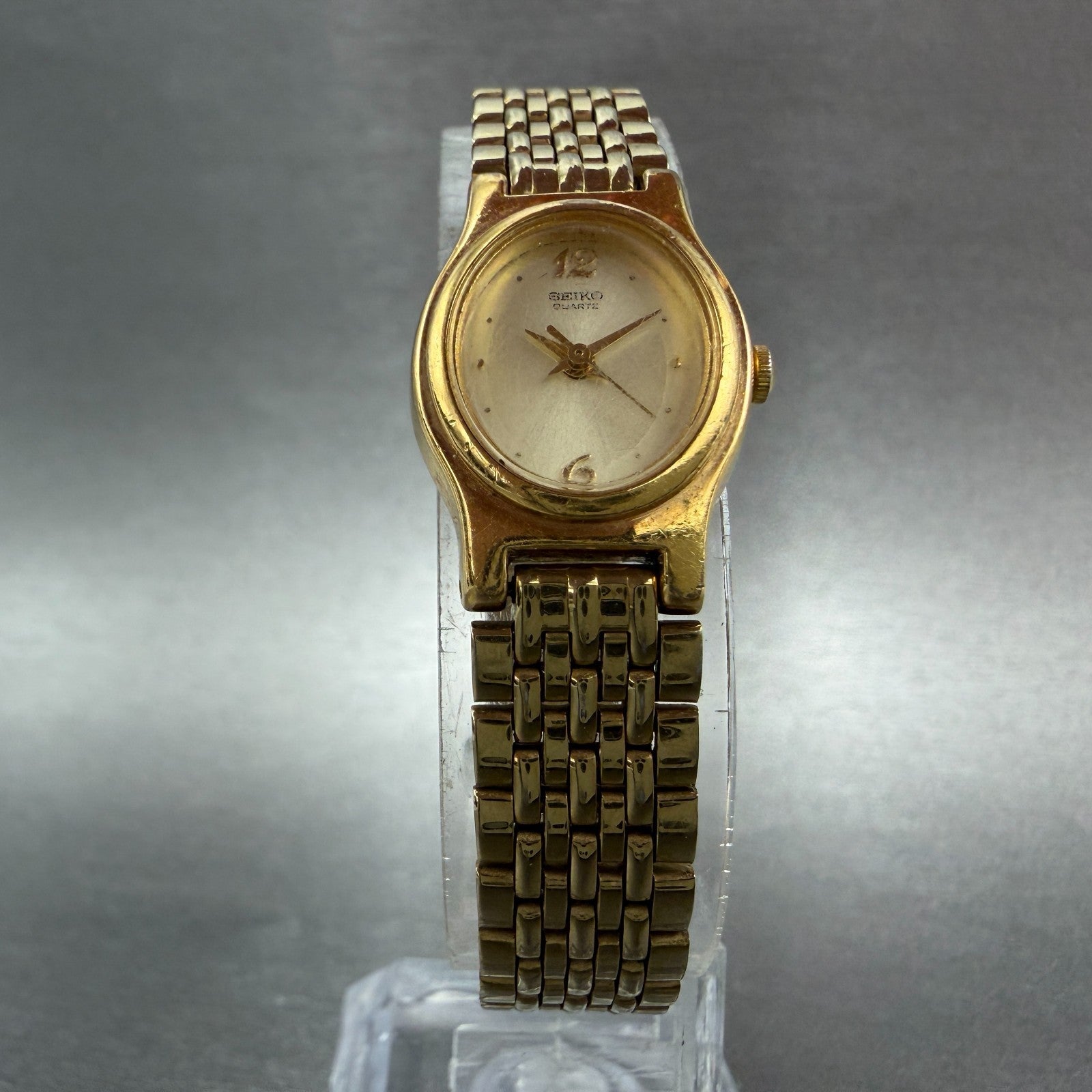 Seiko Watch Women 17mm Champagne Dial Gold Tone Oval V401-5109 New Battery VTG5