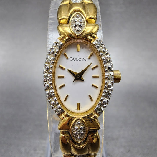Bulova Crystal Watch Women 16mm White Dial Gold Tone Crystal Bezel New Battery0