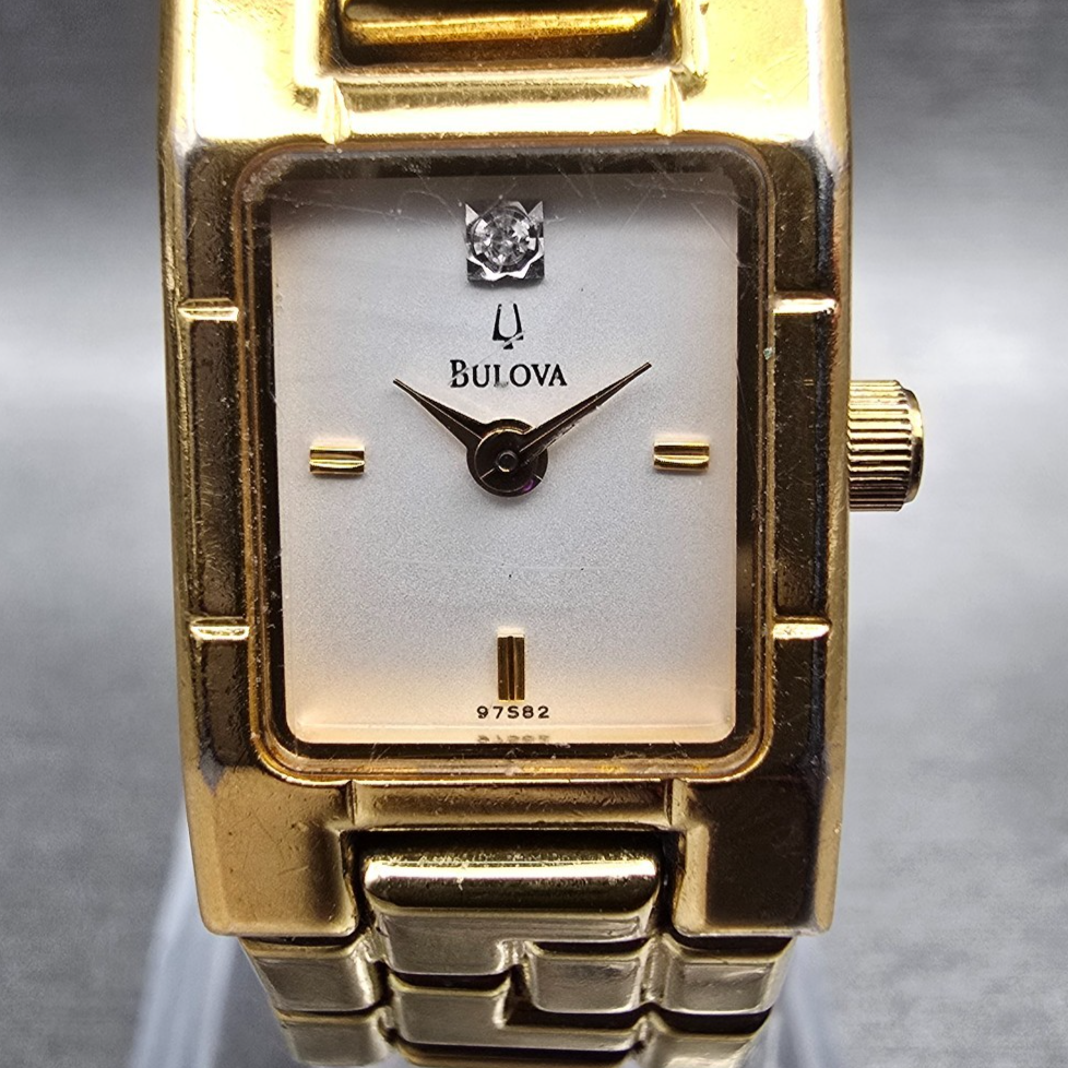 Bulova Watch Women 15mm White Dial Gold Tone Rectangle 97S82 New Battery1