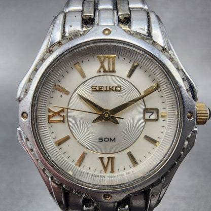 Seiko Watch Women 28mm White Dial Two Tone Date Round 7N82-0GE0 New Battery