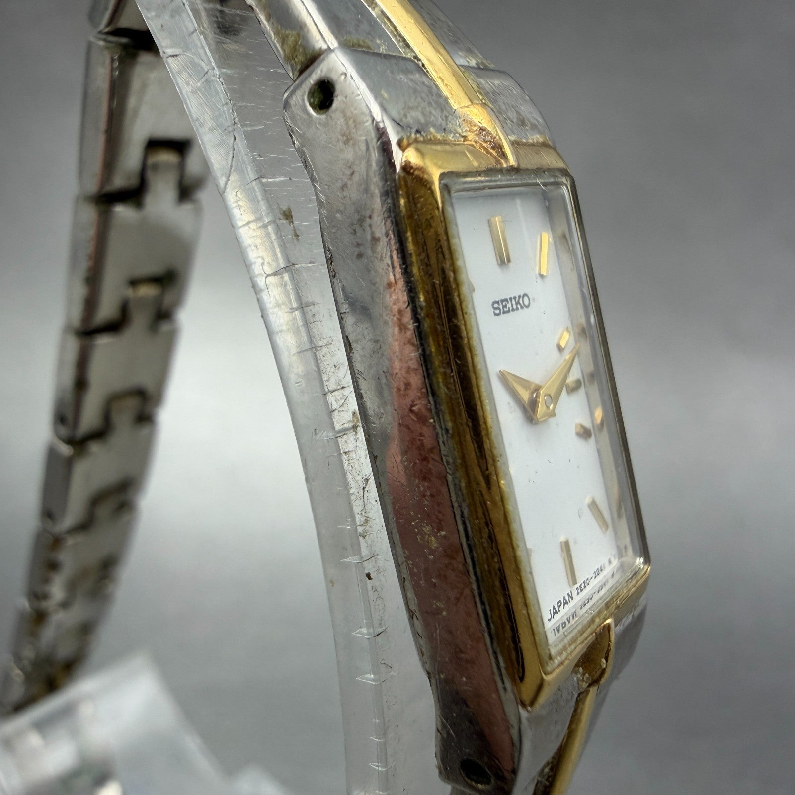 Seiko Watch Women 12mm White Dial Two Tone Rectangle 2E20-7479 New Battery JHK123