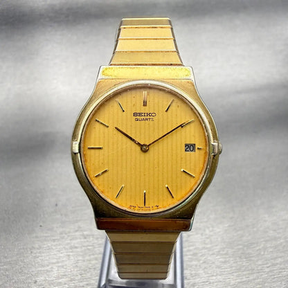 Seiko Watch Men 33mm Gold Dial Gold Tone Date Round 7439-7010 New Battery VTG0