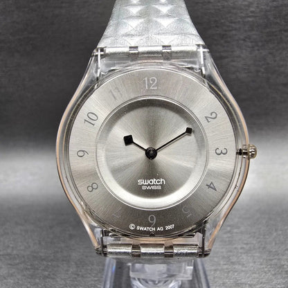 Swatch Skin Facet Glam Watch Women 34mm Silver Dial Clear Case SFK312 New Batt2